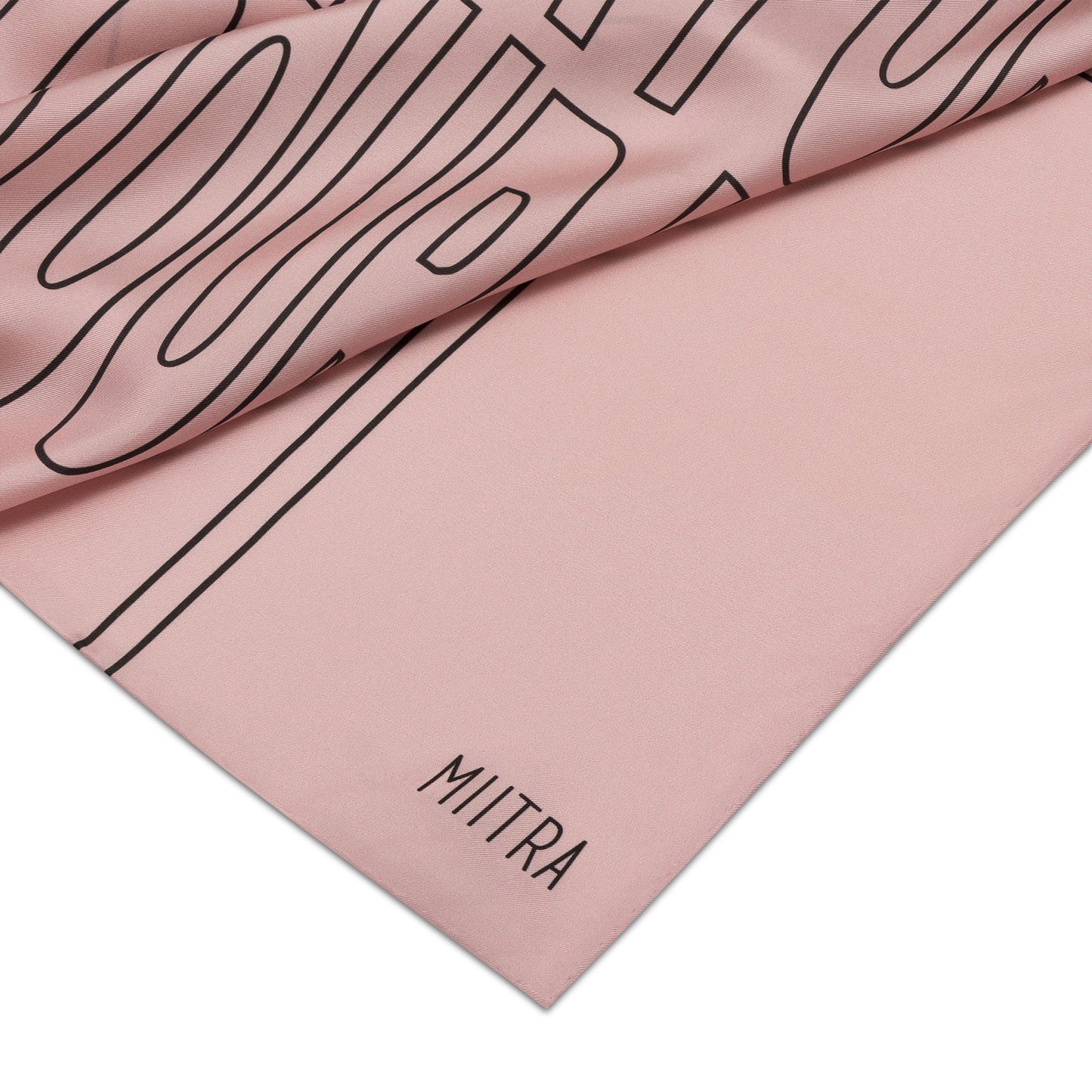 A close up view of the MIITRA logo on a pink silk scarf?id=22984581939387